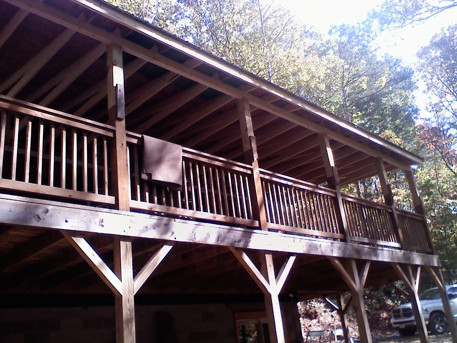 Timber framing under a new elevated porch and deck — Roof Leak Repair in Mulliken by Roofing Brothers